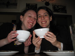 Sasha and Julie at the crepes restaurant with huge bowls of hot chocolate