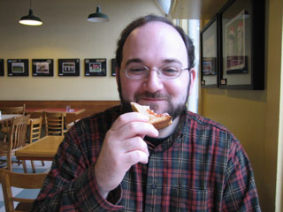 Michael eating toast at Louisa's