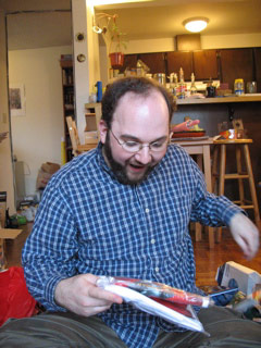 Michael opening a present
