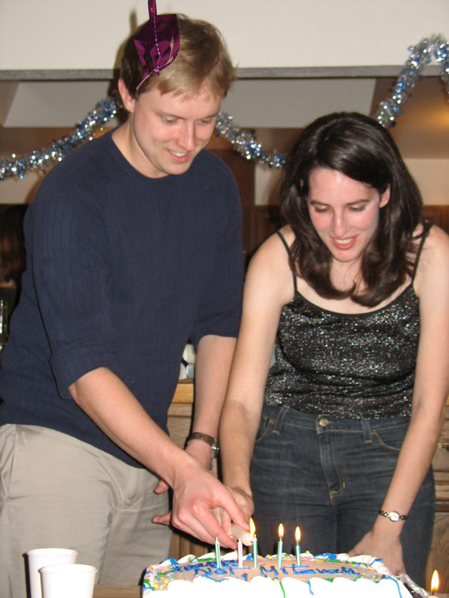 Jake and Julie light a candle