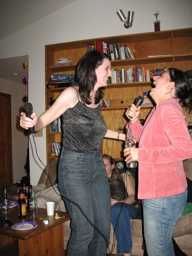 Julie and Erin sing karaoke