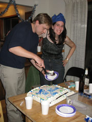 Jake and Julie distribute cake