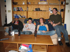 Mo, Evan, Katie and Noah lounge on the couch