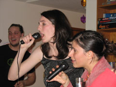 Julie and Erin sing karaoke