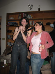 Julie and Erin sing karaoke